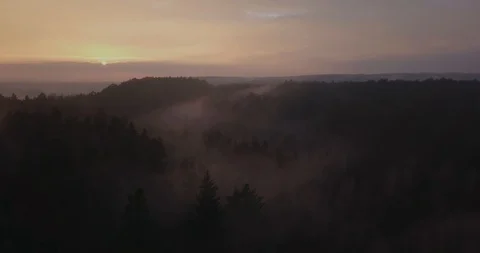 Sunset above misty forests in Lithuania, Europe Stock Footage 121856473