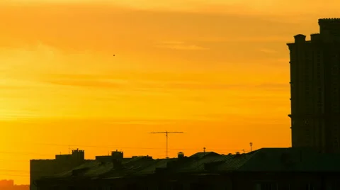 Sunset above the roofs of the city Stock Footage 52095913