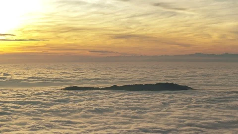Sunset above Sea of Clouds Stock Footage 98502766