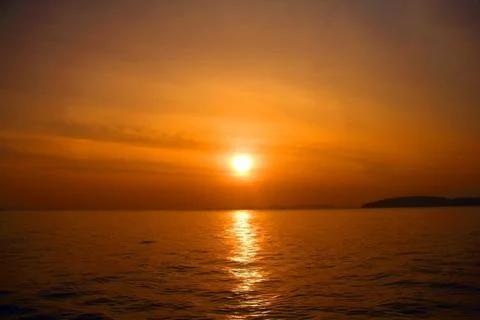 Sunset above the sea Stock Photos