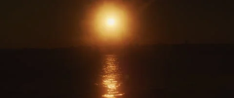 Sunset above the water surface. Slow motion, nature background Stock Footage 147566091