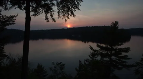 Sunset across a Lake Stock Footage 42565133