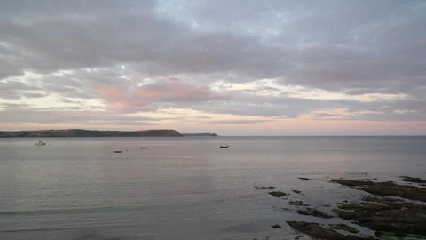 Sunset across small harbour Seq A Pt1 of 9 Stock Footage 240947038