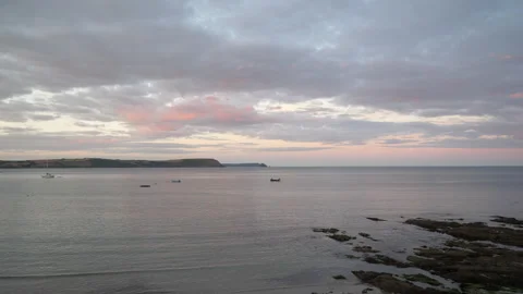 Sunset across small harbour Seq A Pt3 of 9 Stock Footage 240950083