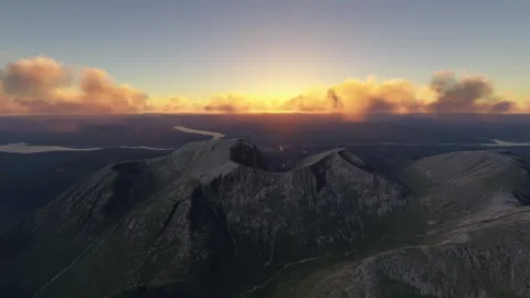 Sunset aerial of Ben Nevis Mountain in Fort William. United Kingdom Stock Footage 320511591