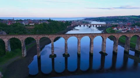 Sunset aerial clip of the Royal Border Bridge Viaduct, England, UK. Stock Footage 293466489