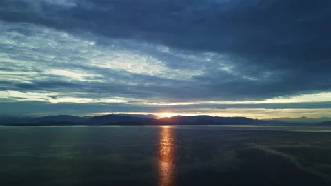 Sunset aerial with clouds and warm sun Stock Footage 216621963