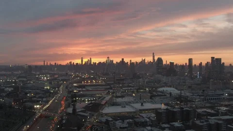 Sunset aerial drone shot of New York City skyline, slow dolly Stock Footage