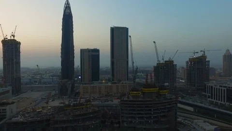 Sunset Aerial drone view of Skyscraper buildings around Burj Khalifa Stock Footage 100867491