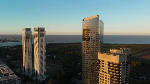 Sunset Aerial drone view of skyscraper buildings in Puerto Madero, Buenos Aires Stock Footage 100887149