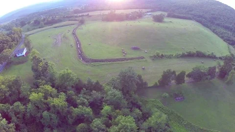 Sunset aerial farm flyover Stock Footage 75214423