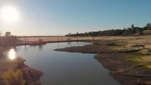 SUNSET AERIAL LAKE 01 Stock Footage 99677563