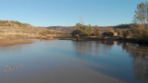 SUNSET AERIAL LAKE 03 Stock Footage 99677559