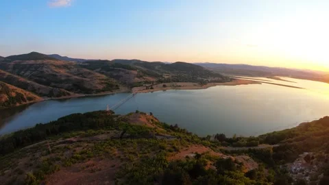 Sunset Aerial Over Studen Kladenets Reservoir Toward Lisytsite Suspension Bridge Stock Footage 321337717
