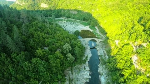 Sunset Aerial Retreat Over Devil’s Bridge and Arda River Stock Footage 321372779