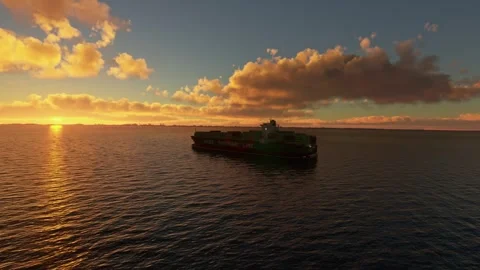 Sunset aerial shot of a cargo container ship in Changi Bay. Singapore 스톡 동영상 276893642