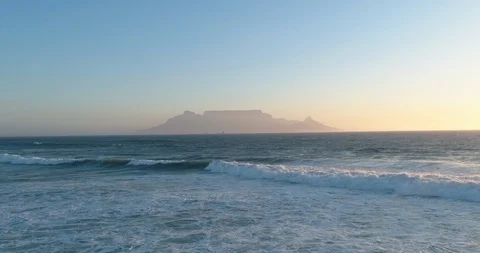 Sunset Aerial of Table Mountain Silhouette at Sunset with Beach Video stock 92055136
