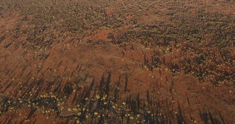 Sunset aerial view of Ayers Rock Outback Australia Stock Footage 112883203
