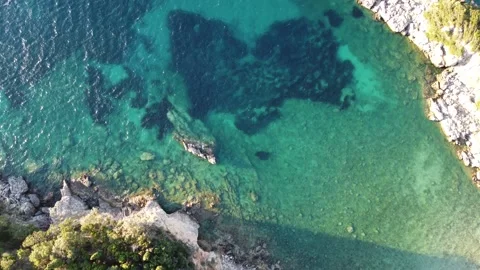 Sunset aerial view of clear sea in corfu greece Stock Footage 312612490
