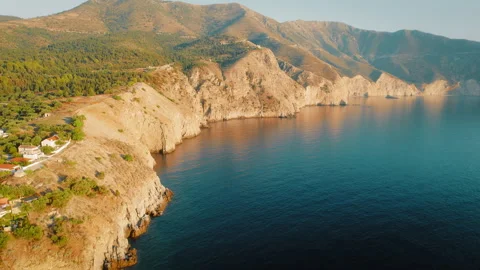 Sunset aerial view of cliffs and calm sea on the coast of Kefalonia Greece Stock Footage 344912561