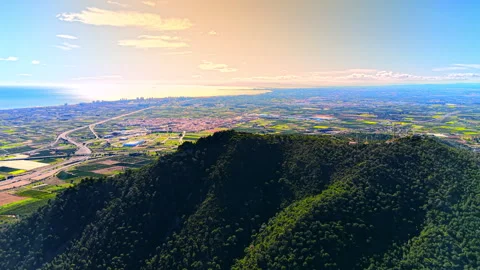 Sunset aerial view of coastal mountain ridge, Spain Video stock 344692920