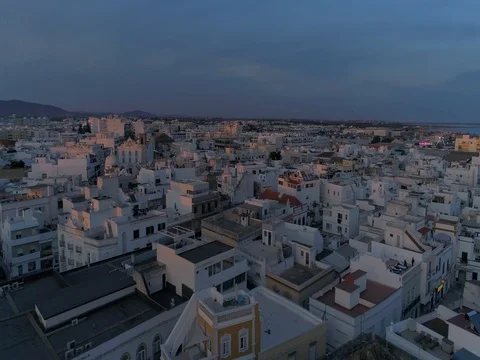 Sunset aerial view of fishing village Olhao, cubist architecture. (360 Pan) Stock Footage