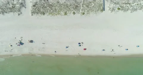 Sunset Aerial View of homes on the Ocean with White Sand Beach Stock Footage 154651564