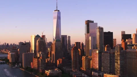 Sunset Aerial View of Lower Manhattan Skyline Featuring One World Trade Cente Stock Footage 301089705