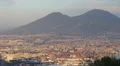 Sunset Aerial View Naples Napoli Skyline Old Town Houses Roofs Mount Vesuvius HD Footage