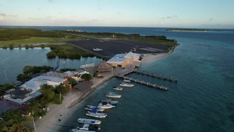Sunset aerial view over flight gran roque beach airport view Stock Footage 296816895