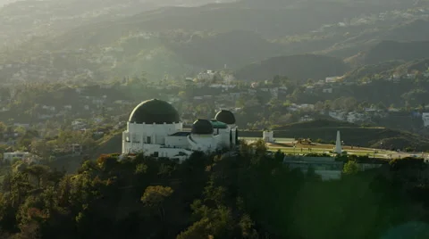 Sunset aerial view over the Griffith Observatory Los Angeles California Stock Footage 64784595