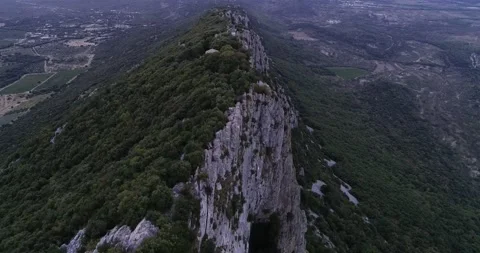 Sunset Aerial view of the Pic St Loup in Occitanie South of France Stock Footage 196808741