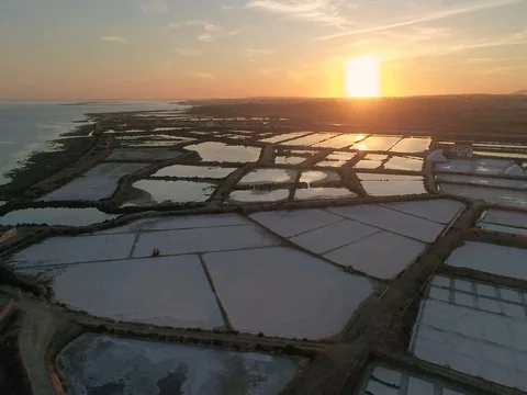 Sunset aerial view, in Ria Formosa wetlands natural park, salt pans (Shot A) Stock Footage 79909222