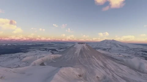 Sunset aerial view of the snow at Mt Tongariro in North Island. New Zealand Stock Footage 322960941