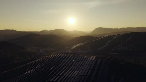 Sunset aerial view of solar panels stand energy landscape nature environment Stock Footage 342168389