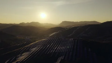 Sunset aerial view of solar panels stand energy landscape nature environment Stock Footage 342168390