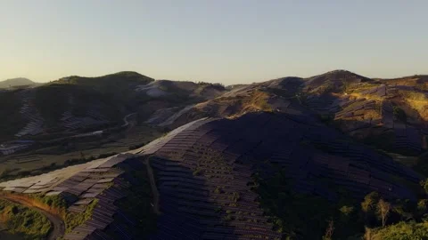 Sunset aerial view of solar panels stand energy landscape nature environment Stock Footage 342168391