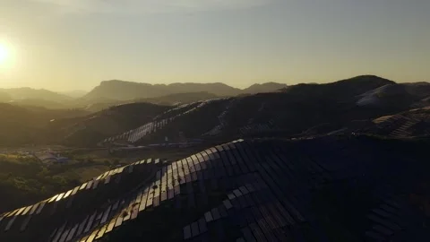 Sunset aerial view of solar panels stand energy landscape nature environment Stock Footage 342168418
