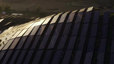 Sunset aerial view of solar panels stand energy landscape nature environment Stock Footage 342168420