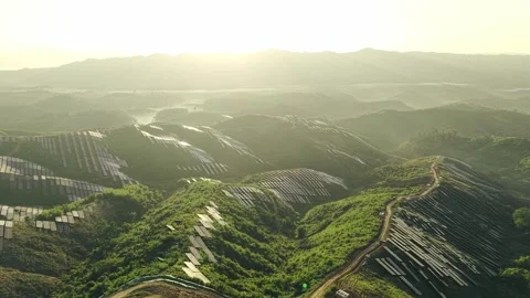 Sunset aerial view of solar panels stand energy landscape nature environment Video stock 344445841