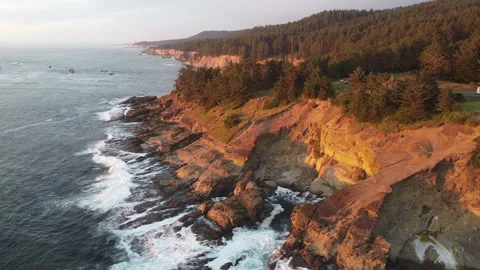 Sunset Aerial View of Sunset Cliffs Over Waves Crashing on Rock Islands, Coast Stock Footage 226033682