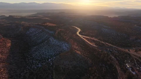 Sunset Aerial View of Winding Mountain Highway into Los Alamos New Mexico 4K Stock Footage 328715025