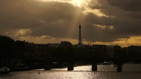 Sunset after Paris city with Eiffel Tower and bridge Stock Footage