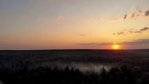 Sunset against the background of the forest and fog.  Aerial photography Vídeos de archivo 94420939