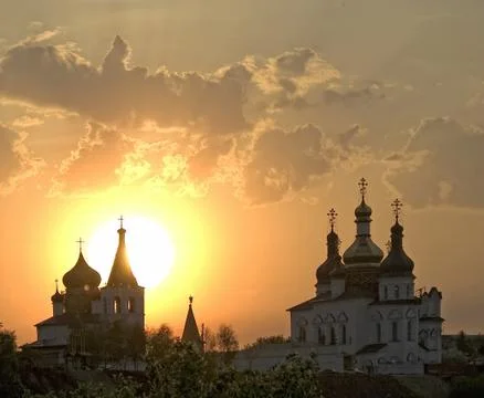 Sunset against Holy Trinity Monastery. Tyumen Stock Photos