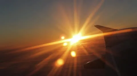 Sunset airplain flight 2 Stock Footage 10920026