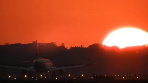 Sunset with airplane driving in the shot Video stock 88329189