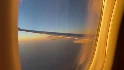 Sunset from the airplane window Stock Footage 161095373