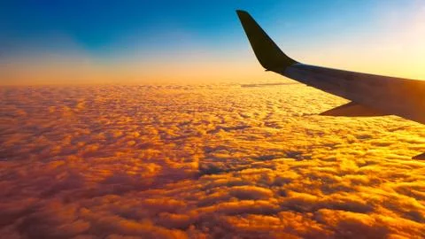 Sunset from the airplane window  Stockfoto's