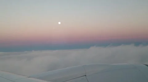 Sunset from Airplane Window with Wing Video stock 57169103